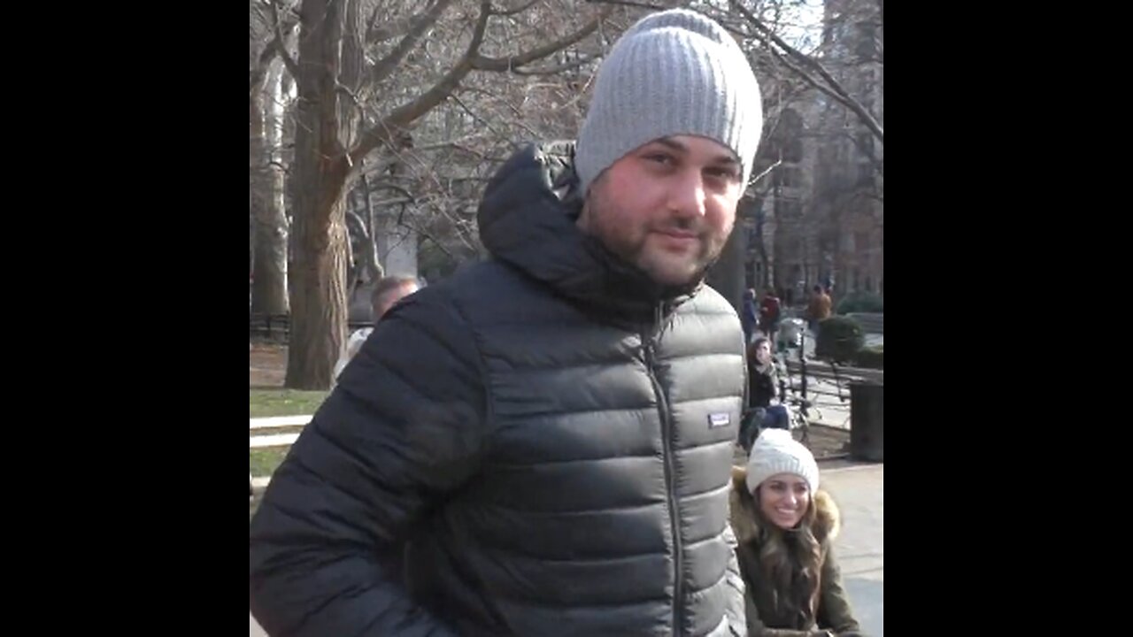 Luodong Massages White Man On Orange Mat At Washington Square Park