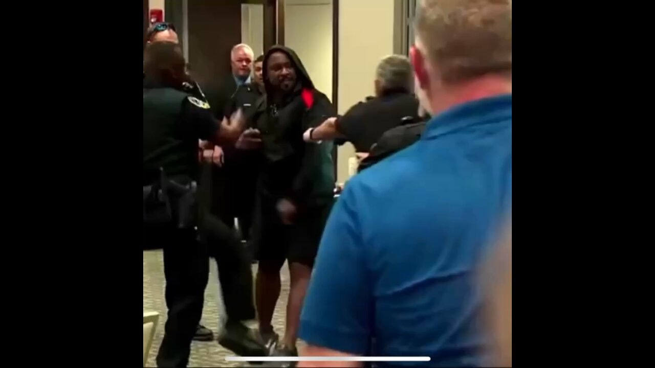 Marjorie Taylor Greene standing strong against crazy, protesting Democrats in a Town Hall.