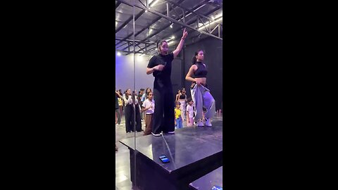 beautiful girl romantic dance moves with partner on dancing stage