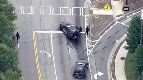 Police respond to an active shooter report at Emory University in Atlanta.