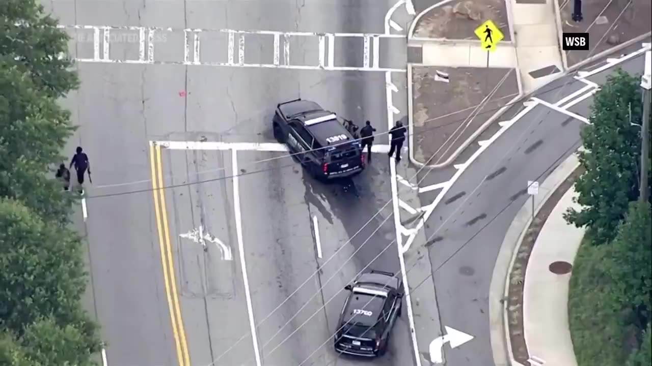 Police respond to an active shooter report at Emory University in Atlanta.