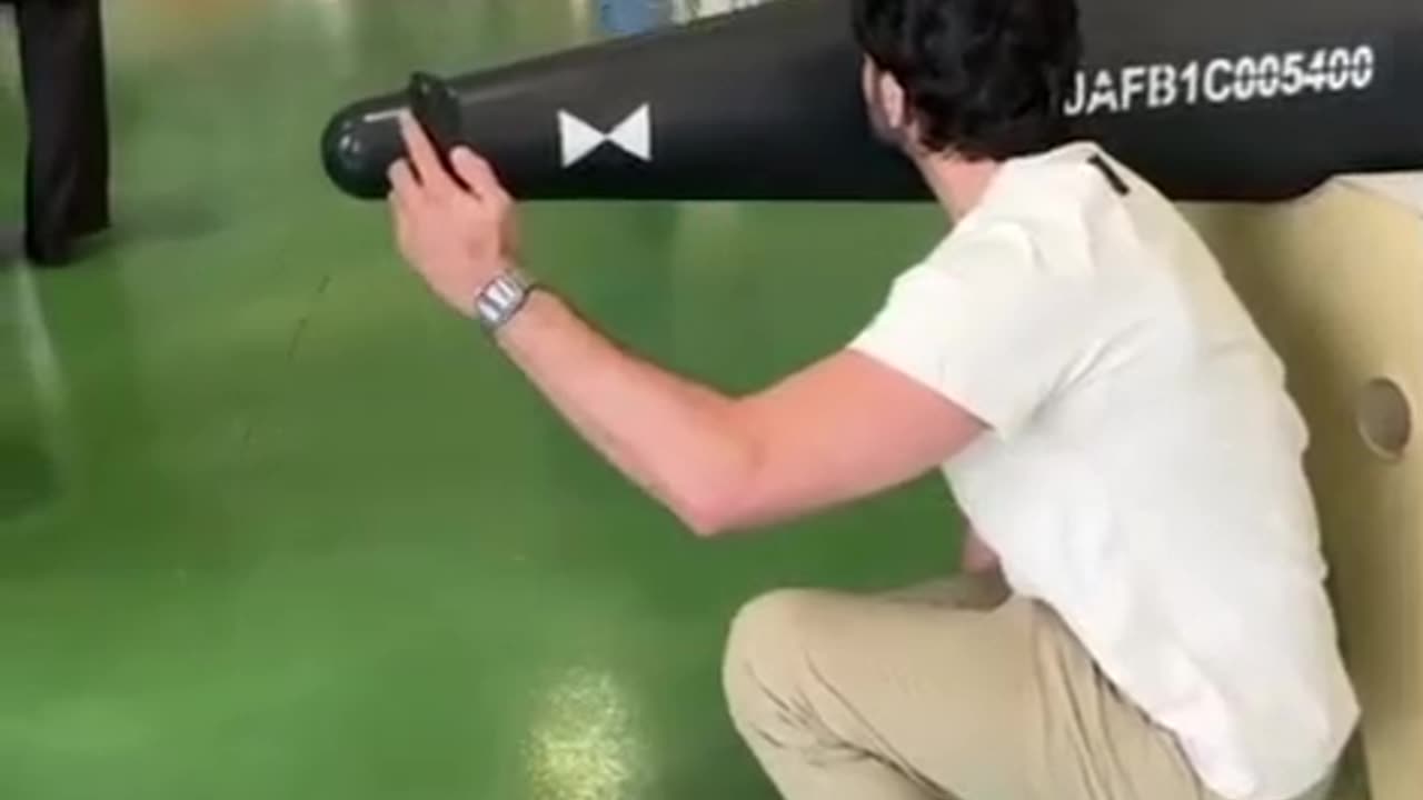 Kissing an Iranian hypersonic missile by Ahmed Saaduddin, American filmmaker
