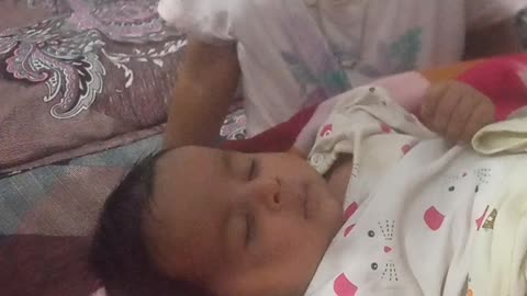 Cute girl sleep over a kid