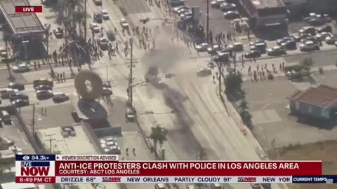WATCH: Rioters waving Mexican flags sets vehicle on fire in Paramount, California.