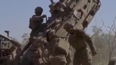 Firing_Howitzers_at_Extreme_High_Angles