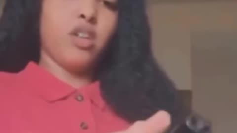 Mixed negro teenaper almost kills herself accidentally......don't play with guns!