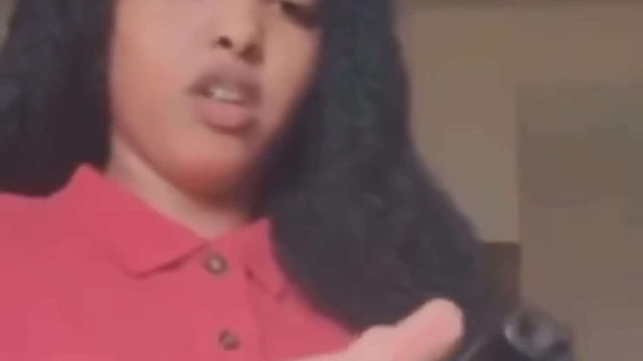 Mixed negro teenaper almost kills herself accidentally......don't play with guns!
