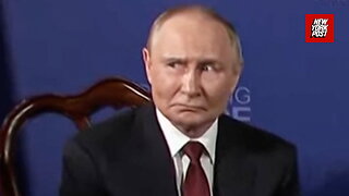 Putin breaks from his typical stone-faced expression moments before Trump meeting begins