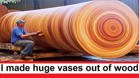 A man made huge vases out of a huge mahogany log, just a masterpiece