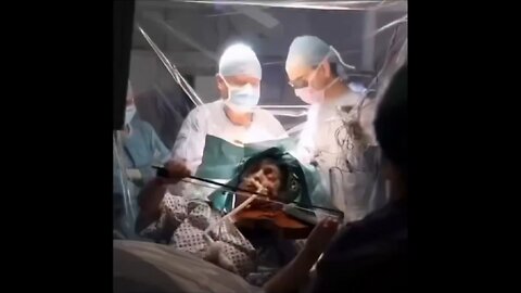 Surgeons Remove A Brain Tumor