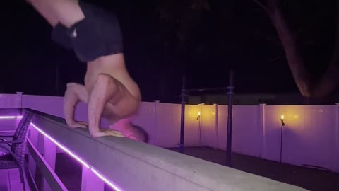 Handstand & Pushup on the Top Rail