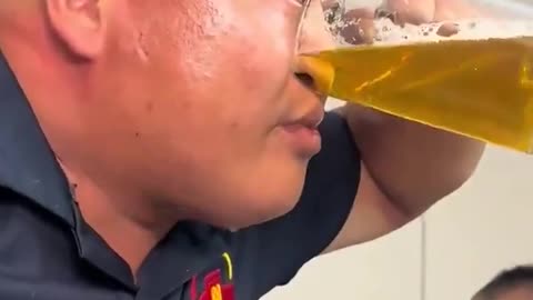 Strange Man Drinks Beer Through Nose