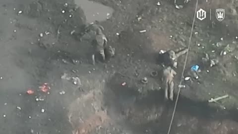 Mass Grave Now Under Construction