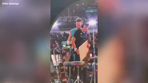 Heartwarming moment Coldplay bring young autistic DJ on stage at Wembley