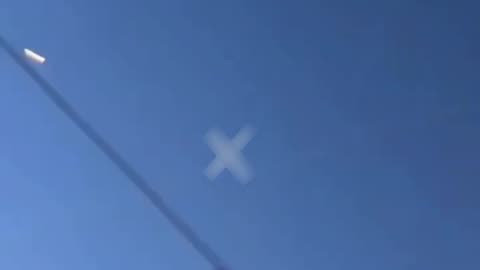 The Moment a Russian Cruise Missile Slams into Parking Lot of Grocery Store