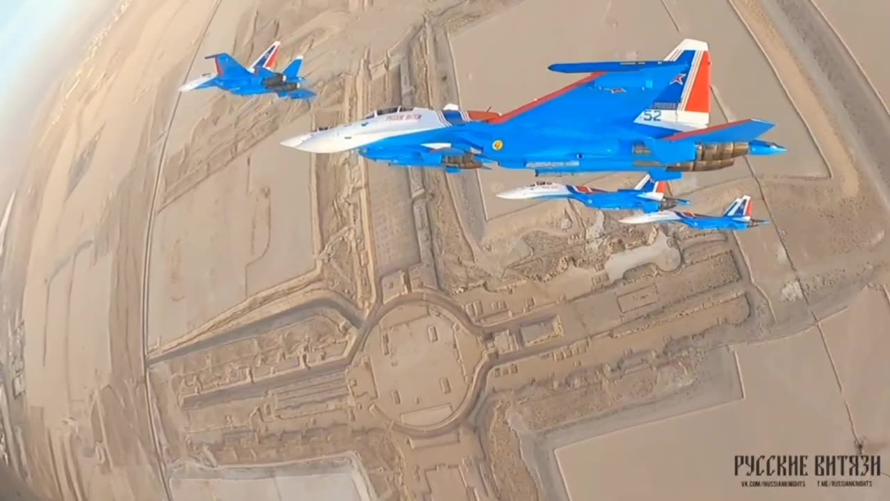 The aerobatic team of the Russian Knights performs in the skies of Dubai.