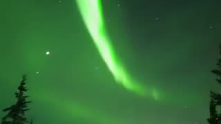 An Alaskan man has shared the aurora borealis view from the porch of his cabin.