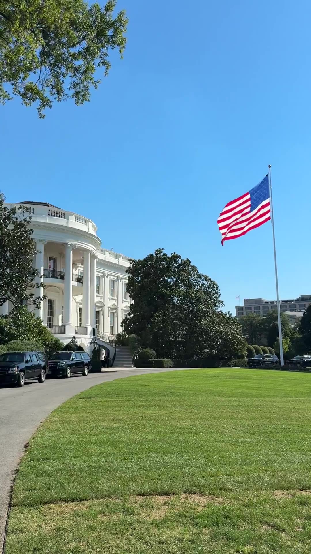 That flag makes the White House look so beautiful.