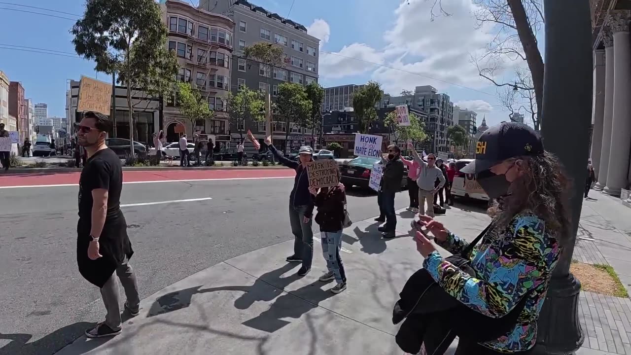 Going to Tesla Protest in DOGE t-shirt and MAGA Hat