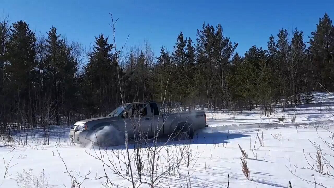 Nissan Frontier in deep snow