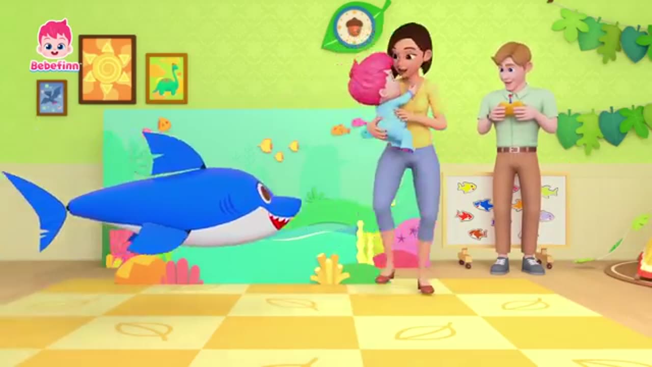 a Shark familly playing with Bebefinn