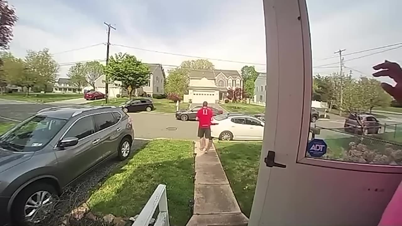 He was still holding the pizza