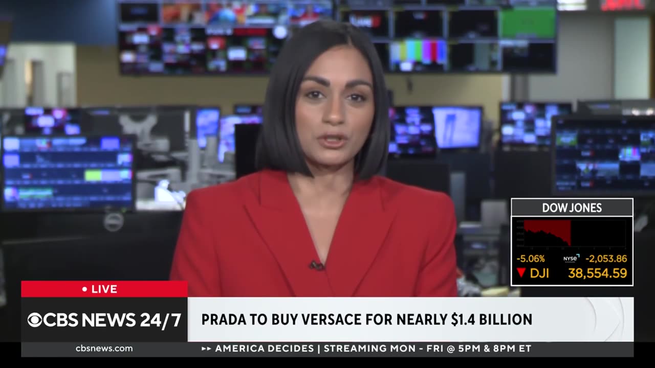 Prada to buy Versace for nearly $1.4 billion.mp4