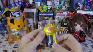 12 piece PEZ mini dispenser and candy Halloween bag