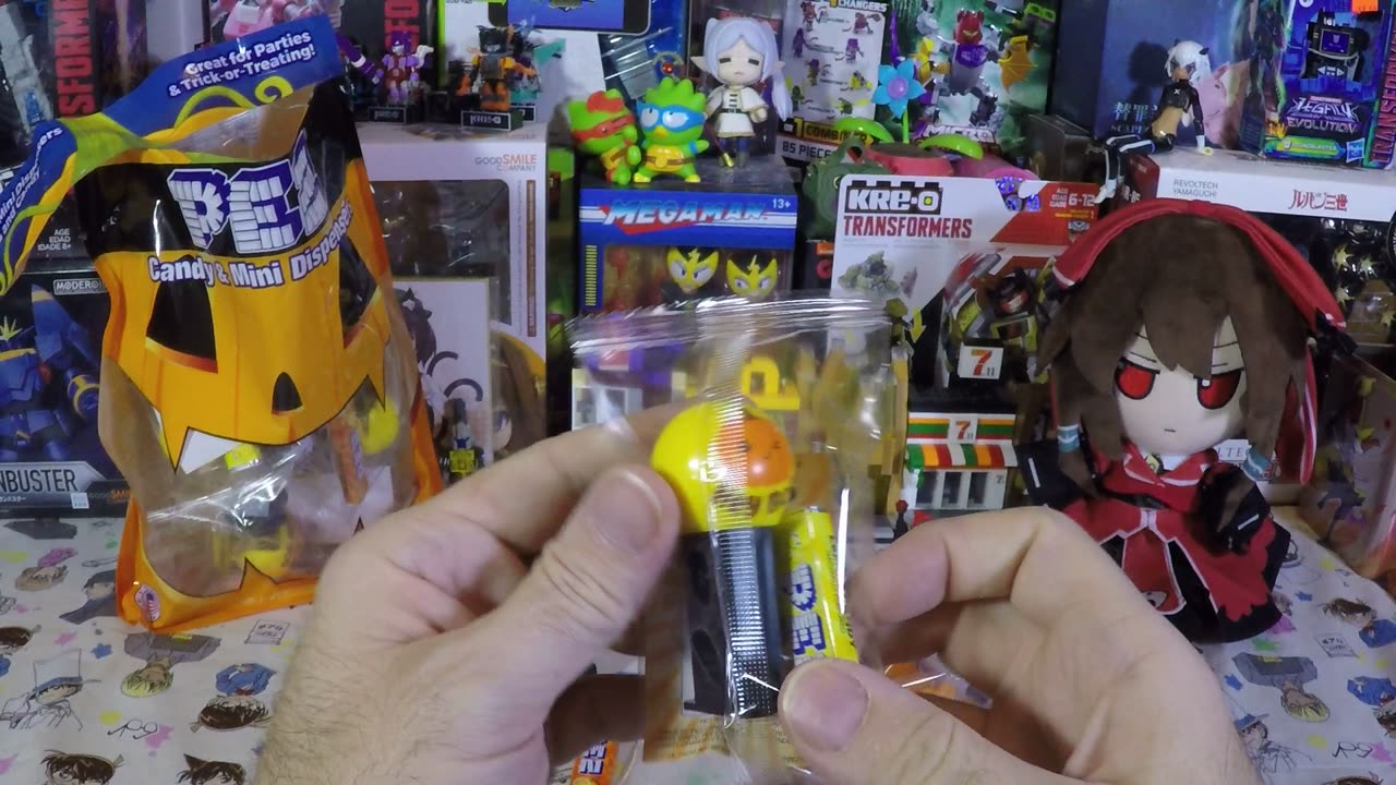 12 piece PEZ mini dispenser and candy Halloween bag