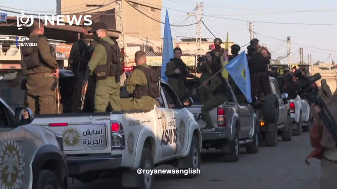Forces of Kurdish-led administration in northeast Syria hold parade
