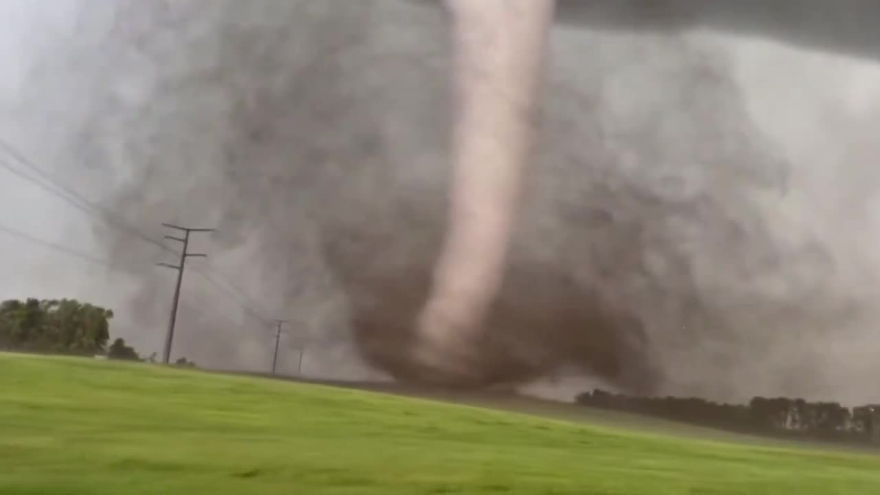 Pro Tornado Chaser Reed Timmer Captures Insane Video of Massive Tornado on the Minn-S.D. Line