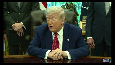 President Donald Trump signs an executive order on nuclear energy