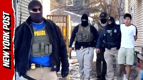 Protesters surround federal agents as two young men are taken away in Minneapolis