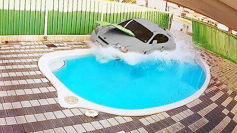Car Crashes into Pool