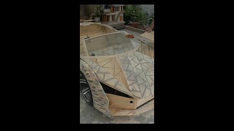 A wooden car is a vehicle constructed entirely or partially of wood, typically from wood and a rigid