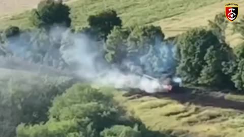 Ukrainain 30th Brigade destroys a Russian tank hidden in a tree line, using a 100mm anti-tank gun