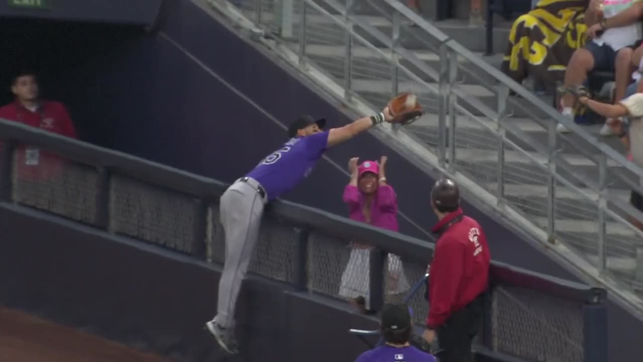 Nick Martini saves a fan!