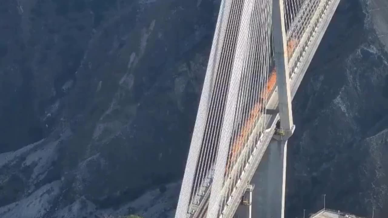 Engineering Marvel! 🚆 Crossing the Sky-High Cable Bridge