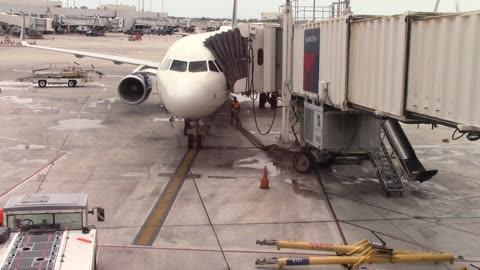 Plane Entering Terminal, Getting Unloaded, and Food Restocking, Creative Commons Stock Video