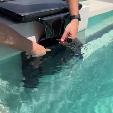 A robot that cleans your swimming pool at the click of a button