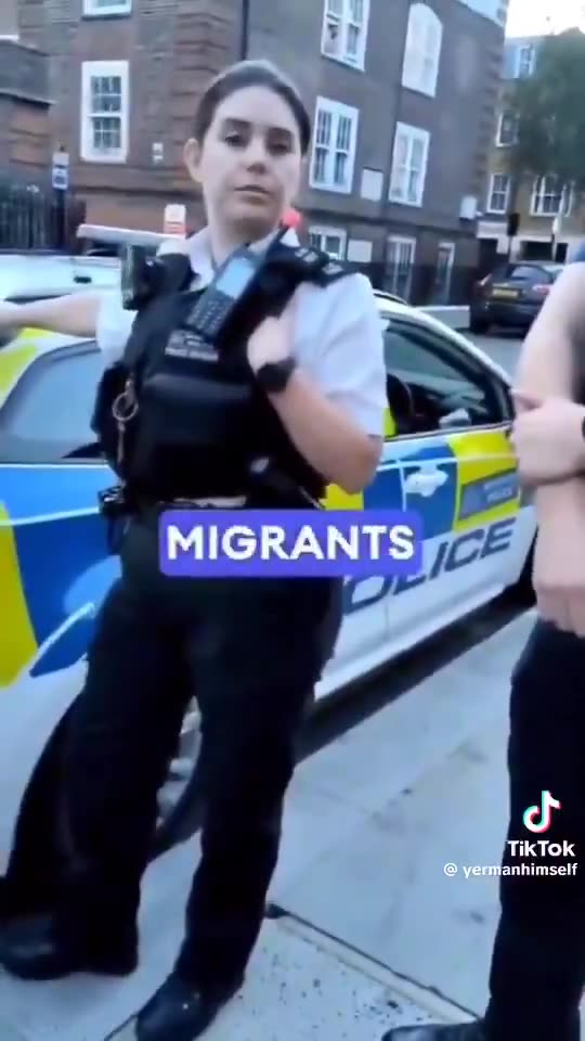 Migrant spits on a young woman.