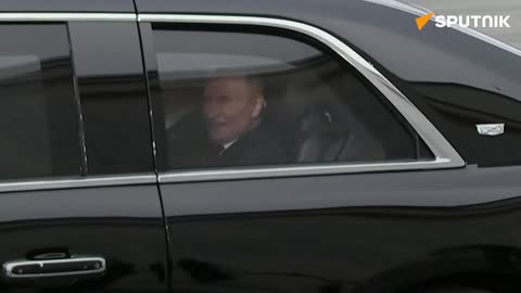 Putin and Trump caught chatting inside Trump's limousine, known as "The Beast"