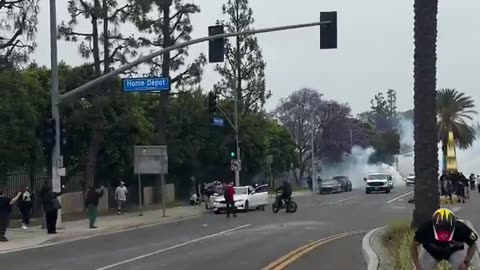 Anti-ICE rioter hurls rock at Federal vehicle leaving Paramount, California