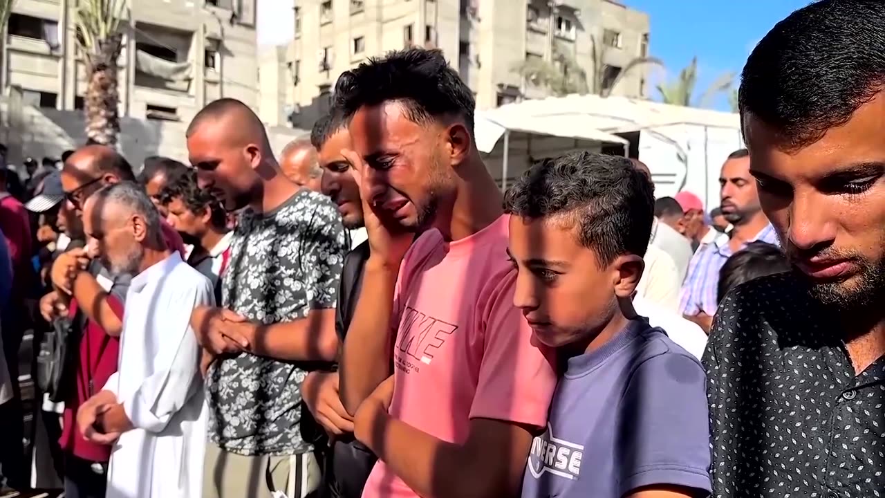Palestinians mourn relatives killed by Israeli fire