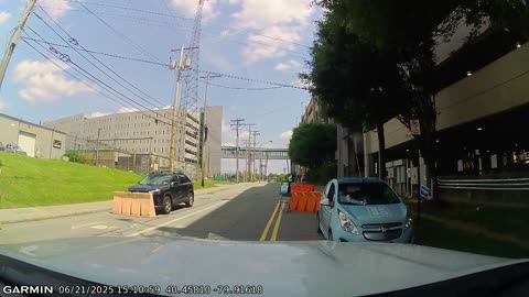 Oblivious Driver Pushes Parking Barrier With SUV