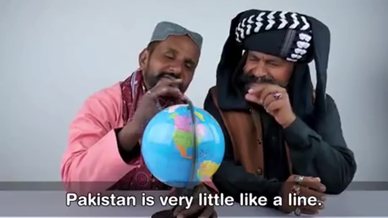 TRIBAL PEOPLE DISCOVERING THE GLOBE FOR THE FIRST TIME