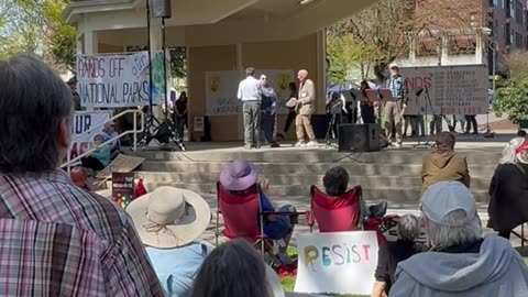 Woman Disrupts Protest and Gets Slapped