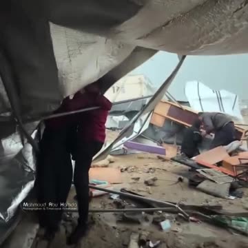Footage shows displaced families’ tents and belongings being swept away by strong winds