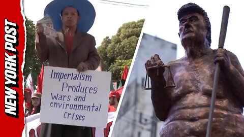 Climate protesters mock President Trump with 'orange plague' statue