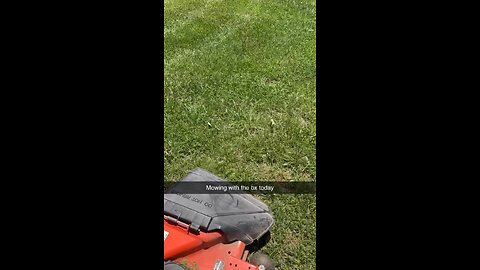 Bx2380 mowing the yard